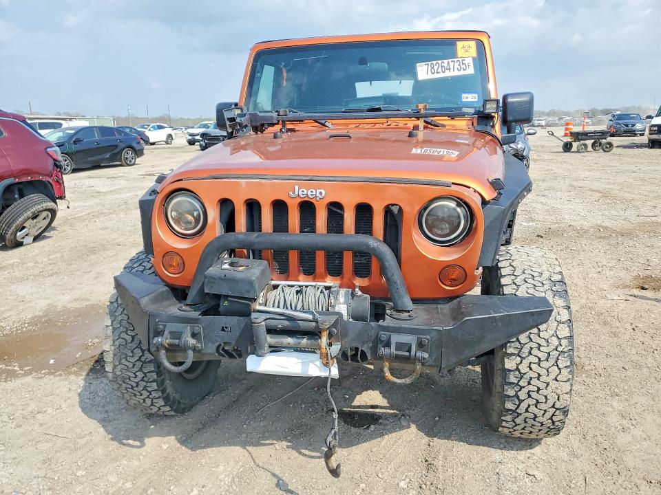 2011 Jeep Wrangler unlimited VIN 1J4BA6H18BL514339 COPART salvage auction — FRONT END, TX - SALVAGE VEHICLE TITLE, sold $2,200 on 2026-07-02 (photo 5)
