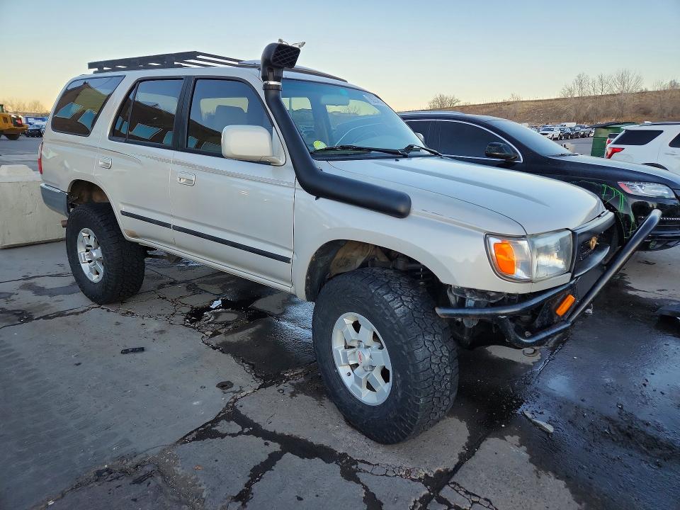 1997 Toyota 4runner VIN JT3HN86R9V0087417 COPART salvage auction — SIDE, CO - SALVAGE TITLE, sold $3,000 on 2026-07-08 (photo 4)
