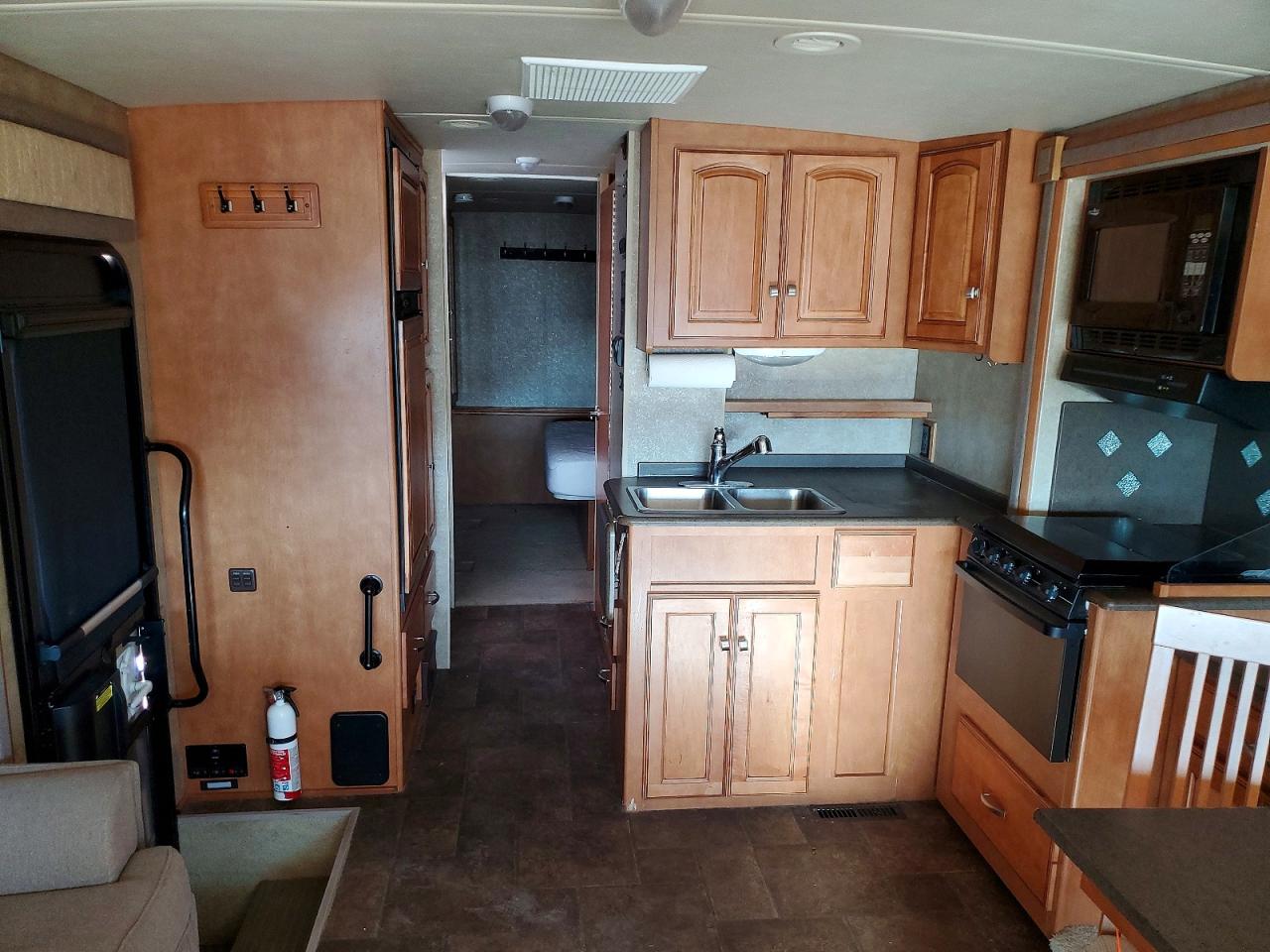 2013 Winn Motorhome VIN 1F65F5DYXD0A00615 COPART salvage auction — Normal Wear, TX - CERTIFICATE OF TITLE, sold $18,100 on 2026-02-17 (photo 6)