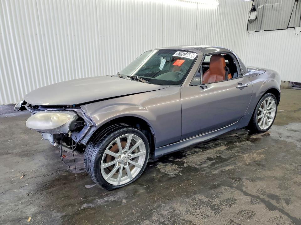 2007 Mazda Mx-5 miata VIN JM1NC26F570124912 COPART salvage auction — STRIPPED, Fl - Certificate Of Title, sold $150 on 2026-07-07 (photo 1)