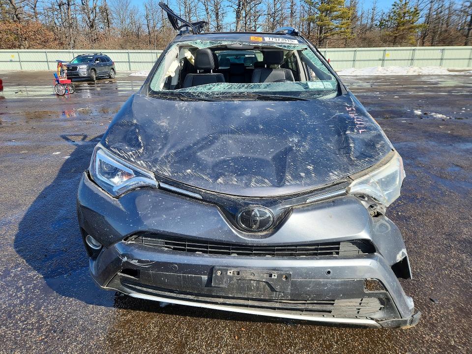 2016 Toyota Rav 4 VIN JTMDFREV6GD194268 COPART salvage auction — ROLLOVER, Id - Salvage Certificate Of Title, sold $2,650 on 2026-07-13 (photo 5)