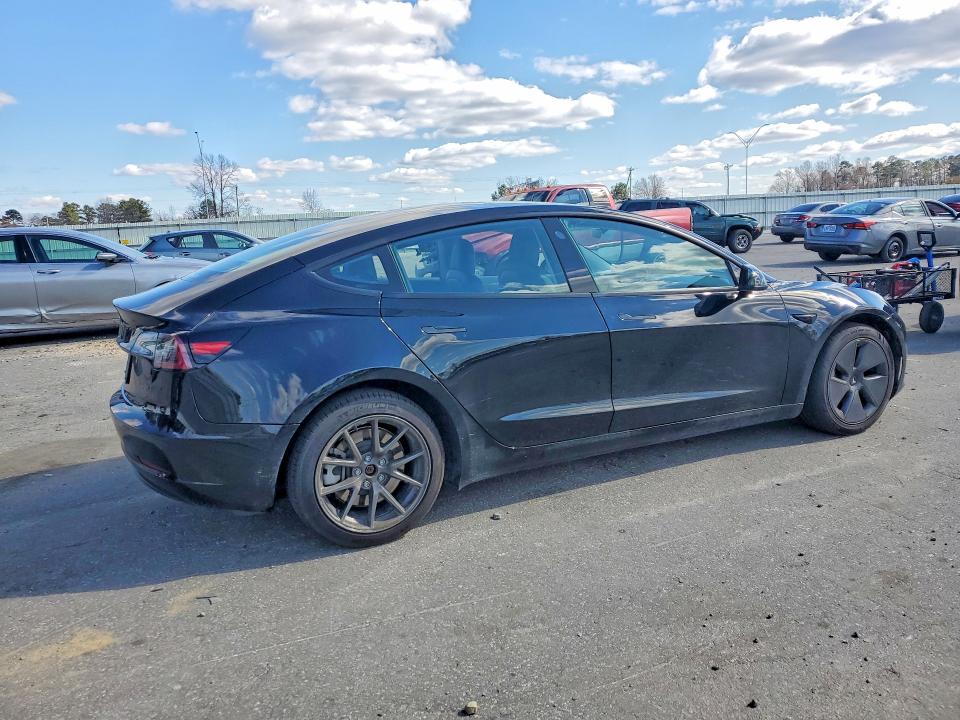 2022 Tesla Model 3 VIN 5YJ3E1EA9NF101245 COPART salvage auction — SIDE, Nc - Salvage Certificate Of Title, sold $375 on 2026-07-09 (photo 3)