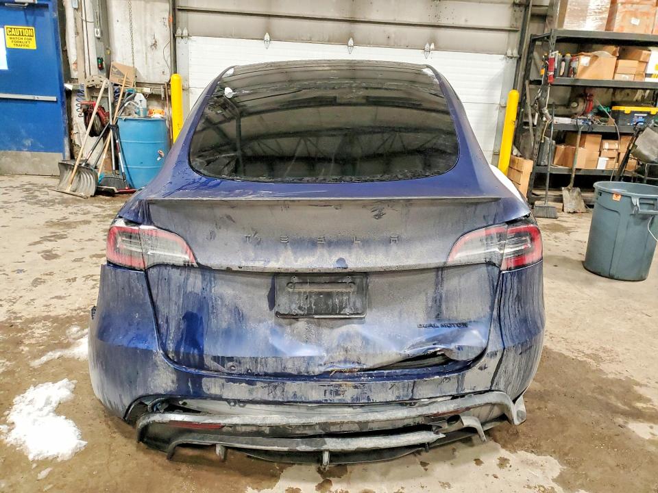 2023 Tesla Model y VIN 7SAYGDEE7PF648573 COPART salvage auction — REAR END, On - Permit No Brand - Unfit, sold $16,650 on 2026-07-02 (photo 6)