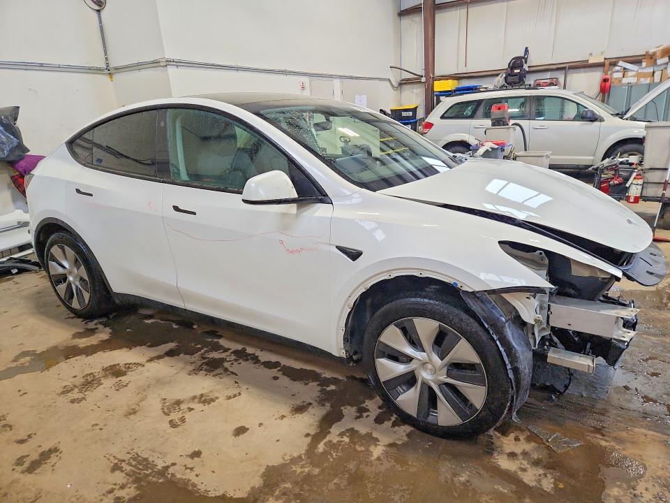 2023 Tesla Model y VIN 7SAYGAEE6PF762837 COPART salvage auction — FRONT END, Salvage Title, sold $12,200 on 2026-07-23 (photo 4)