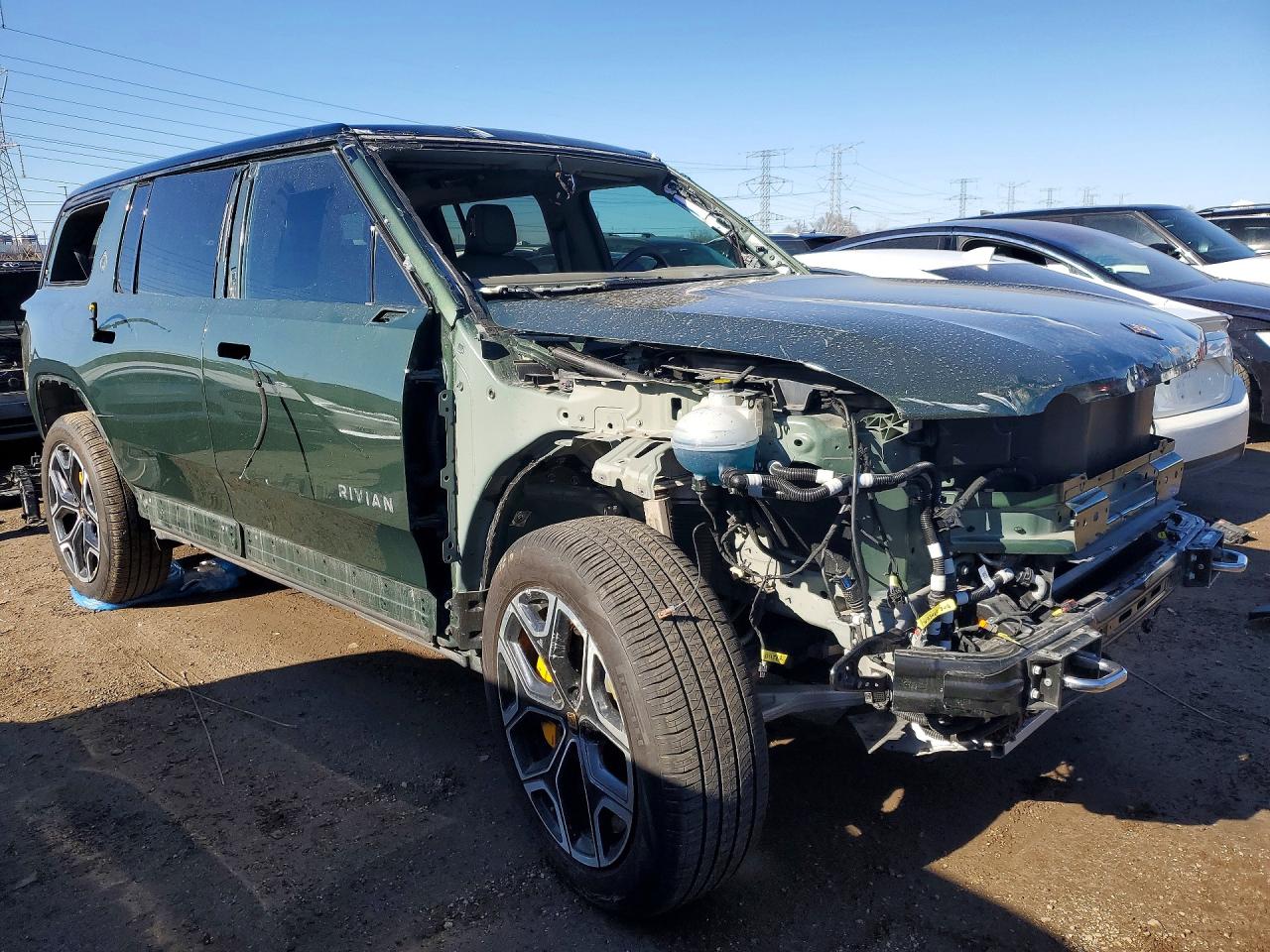 2023 Rivian R1S VIN 7PDSGABL7PN003291 COPART salvage auction — Front End, IL - SALVAGE CERTIFICATE, sold $12,400 on 2026-07-09 (photo 4)