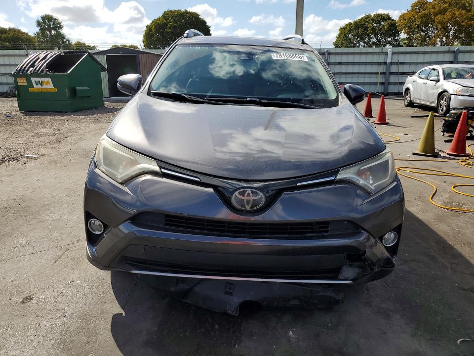 2018 Toyota Rav 4 VIN JTMWFREV8JJ750873 COPART salvage auction — SIDE, Salvage Title, sold $5,100 on 2026-07-15 (photo 5)