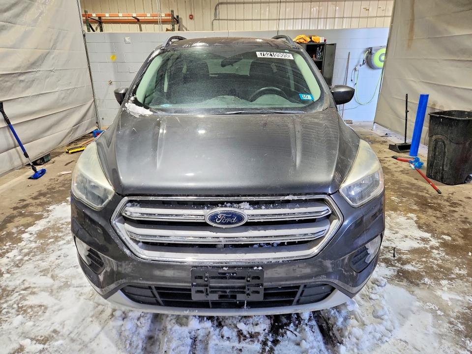 2018 Ford Escape VIN 1FMCU0GD3JUB19239 COPART salvage auction — MINOR DENT/SCRATCHES, NH - CERTIFICATE OF TITLE, sold $100 on 2026-07-09 (photo 5)