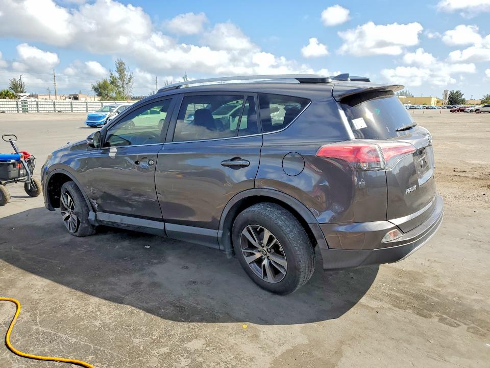 2018 Toyota Rav 4 VIN JTMWFREV8JJ750873 COPART salvage auction — SIDE, Salvage Title, sold $5,100 on 2026-07-15 (photo 2)