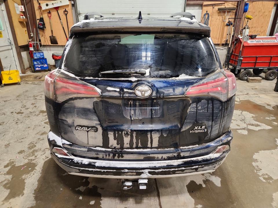 2018 Toyota Rav 4 VIN JTMRJREV0JD256288 COPART salvage auction — FRONT END, AB - BOS - SALVAGE, sold $6,500 on 2026-07-02 (photo 6)
