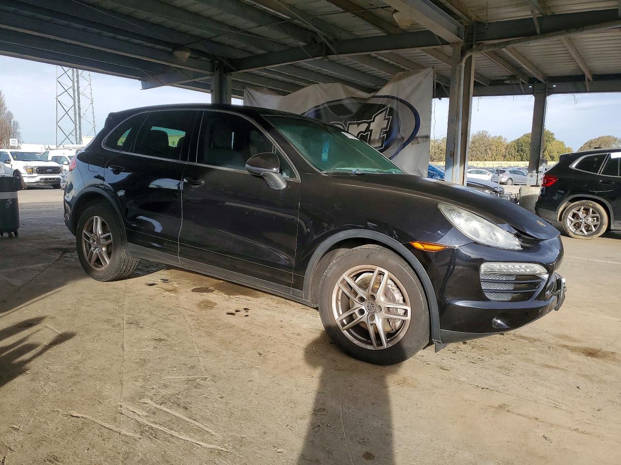 2012 Porsche Cayenne VIN WP1AA2A28CLA09706 COPART salvage auction — Unknown, CA - DIS/DLR/EXP ONLY CLEAN TITLE, sold $3,000 on 2026-03-17 (photo 4)