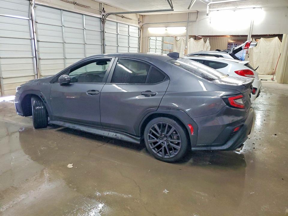 2023 Subaru Wrx VIN JF1VBAL68P9808310 COPART salvage auction — SIDE, Tx - Certificate Of Title, sold $3,100 on 2026-07-21 (photo 2)