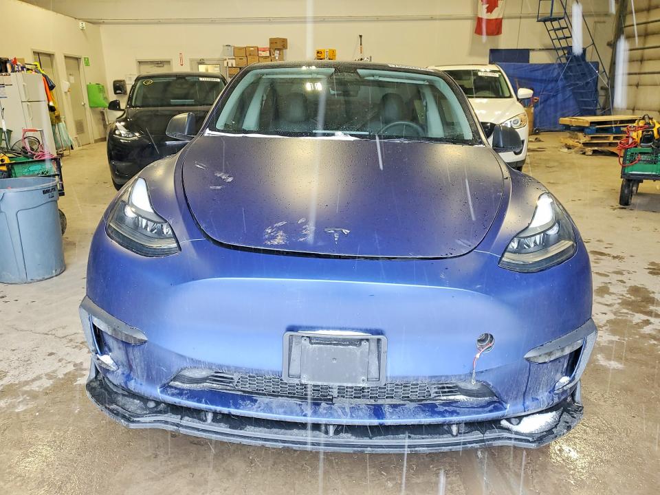 2023 Tesla Model y VIN 7SAYGDEE7PF648573 COPART salvage auction — REAR END, On - Permit No Brand - Unfit, sold $16,650 on 2026-07-02 (photo 5)