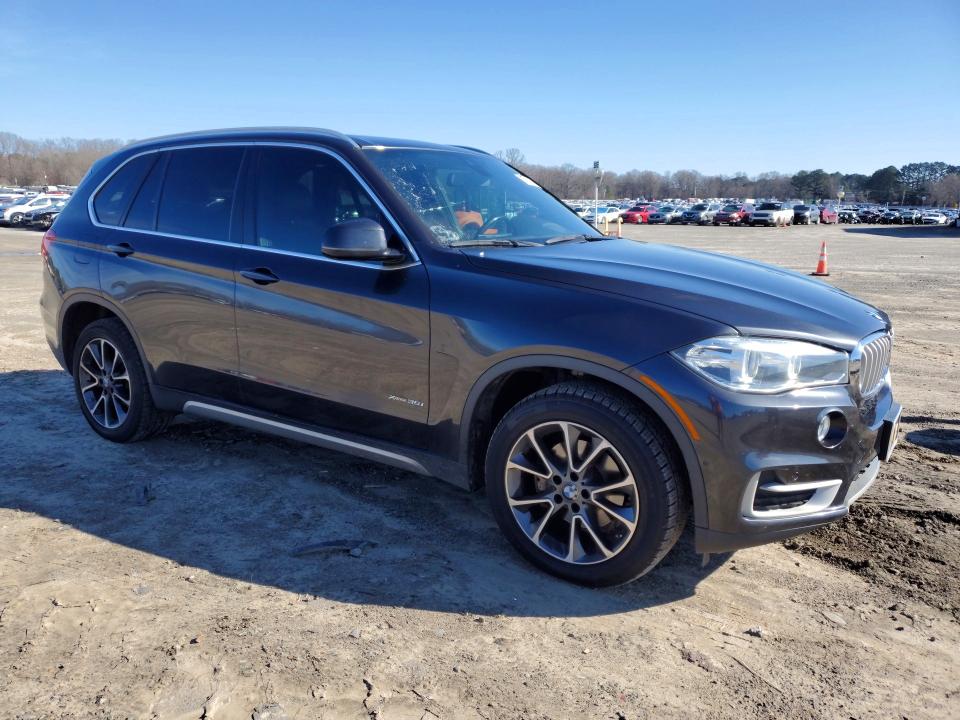 2018 BMW X5 VIN 5UXKR0C54J0X85208 COPART salvage auction — MINOR DENT/SCRATCHES, Ar - Certificate Of Title, sold $5,200 on 2026-07-20 (photo 4)