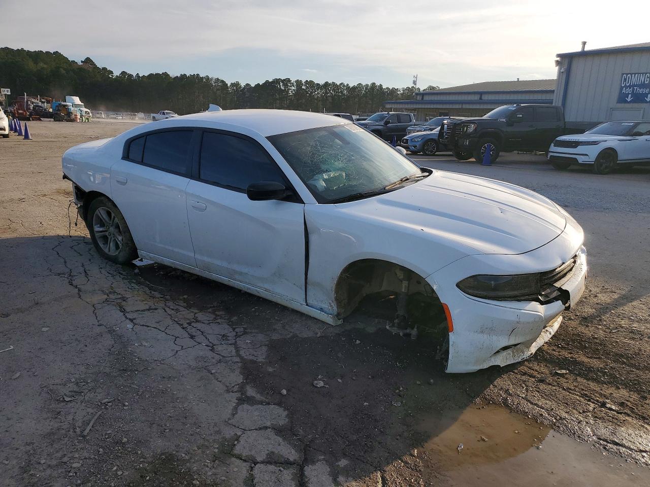 2023 Dodge Charger VIN 2C3CDXBG7PH659465 COPART salvage auction — Front End, MS - CERT OF TITLE-SALVAGED, sold $1,800 on 2026-07-06 (photo 4)