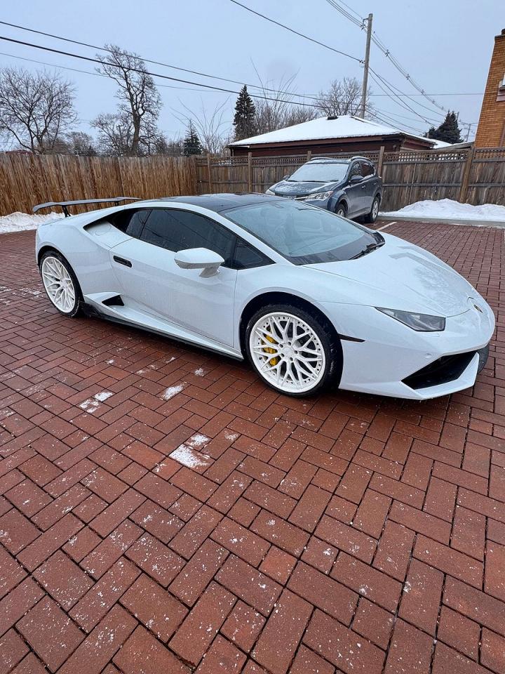 2015 Lamborghini Huracan VIN ZHWUC1ZF8FLA03249 COPART salvage auction — Normal Wear, IN - CERT OF TITLE - REBUILT VEHICL (P), sold $102,000 on 2026-03-23 (photo 1)