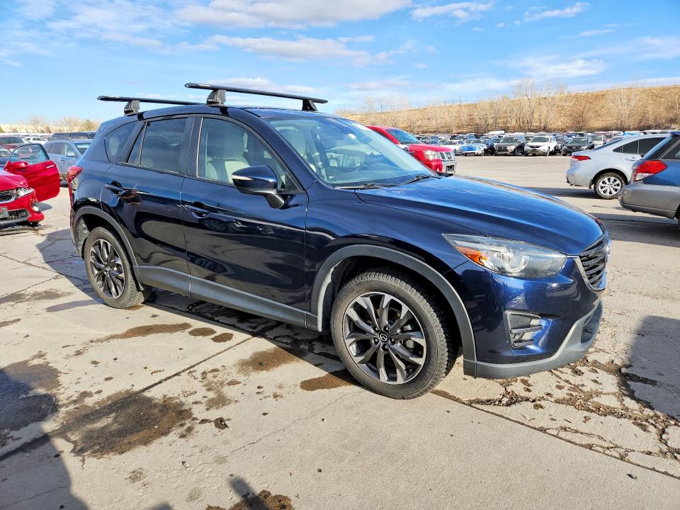 2016 Mazda Cx-5 VIN JM3KE4DY3G0785391 COPART salvage auction — HAIL, Co - Certificate Of Title, sold $7,200 on 2026-07-29 (photo 4)