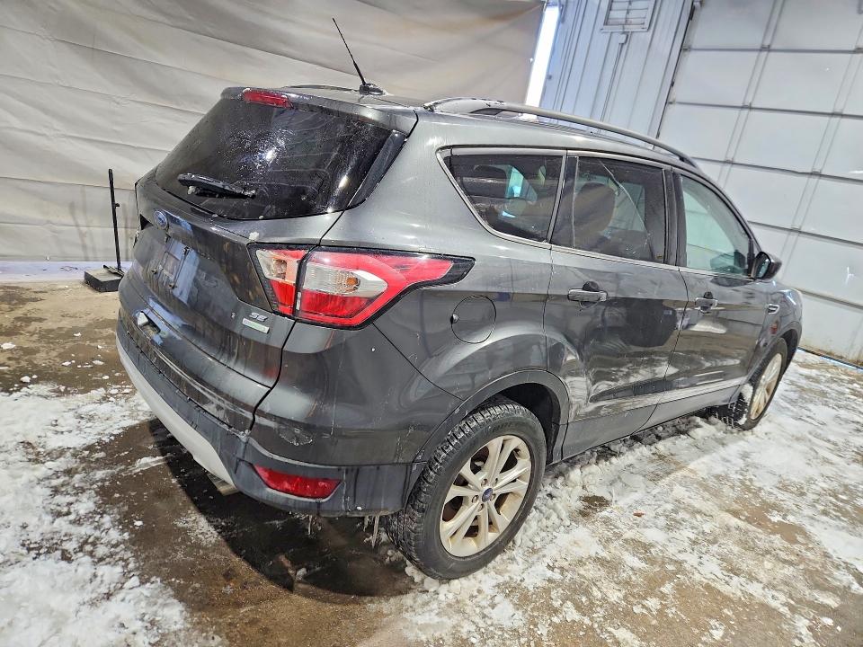 2018 Ford Escape VIN 1FMCU0GD3JUB19239 COPART salvage auction — MINOR DENT/SCRATCHES, NH - CERTIFICATE OF TITLE, sold $100 on 2026-07-09 (photo 3)