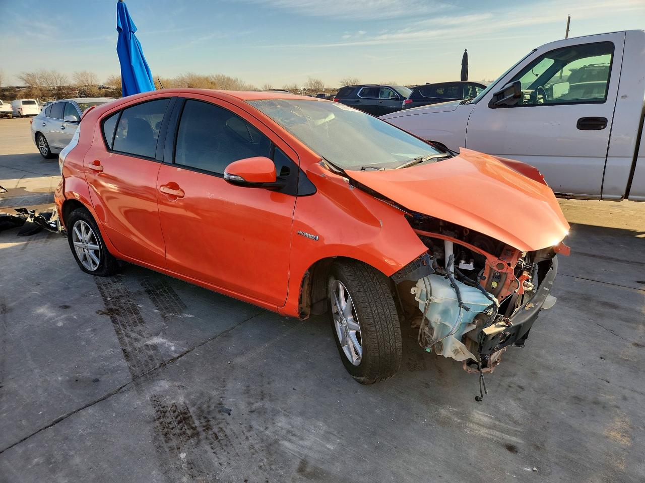 2013 Toyota Prius C VIN JTDKDTB37D1034863 COPART salvage auction — Front End, TX - CERT OF TITLE-REBUILT SALVAGE, sold $900 on 2026-07-02 (photo 4)