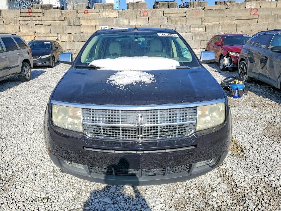 2007 Lincoln townhouse Mkx VIN 2LMDU88C07BJ31151 COPART salvage auction — FRONT END, TX - SALVAGE VEHICLE TITLE, sold $300 on 2026-07-02 (photo 5)