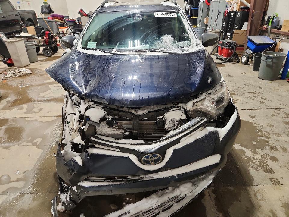 2018 Toyota Rav 4 VIN JTMRJREV0JD256288 COPART salvage auction — FRONT END, AB - BOS - SALVAGE, sold $6,500 on 2026-07-02 (photo 5)