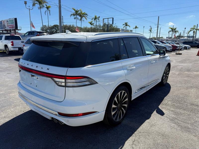 2020 Lincoln Aviator VIN 5LMYJ9YY7LGL15526 COPART salvage auction — Water/Flood, FL - CERT OF TITLE-FLOOD & REBUILT (P), sold $29,750 on 2026-02-18 (photo 4)