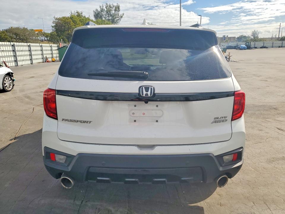 2023 Honda Passport VIN 5FNYF8H05PB017005 COPART salvage auction — FRONT END, Fl - Cert Of Title Slvg Rebuildable, sold $7,700 on 2026-07-13 (photo 6)