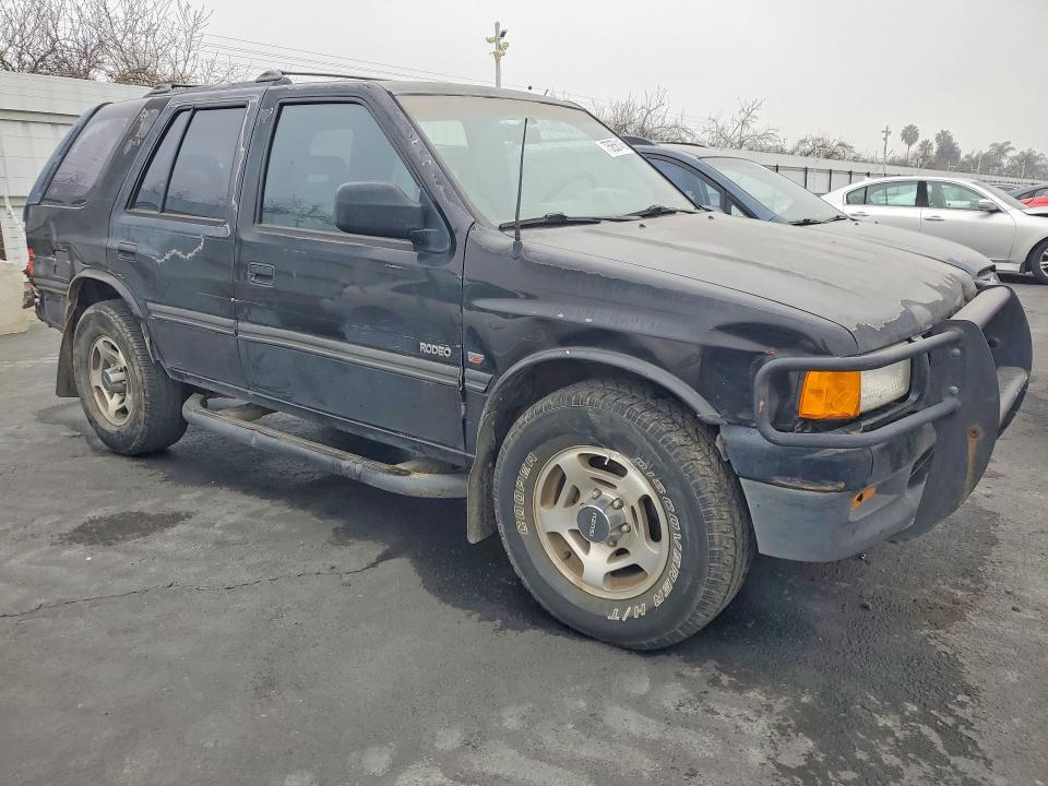 1997 Isuzu Rodeo VIN 4S2CM58V0V4302679 COPART salvage auction — REAR END, Ca - Salvage Certificate, sold $375 on 2026-07-02 (photo 4)