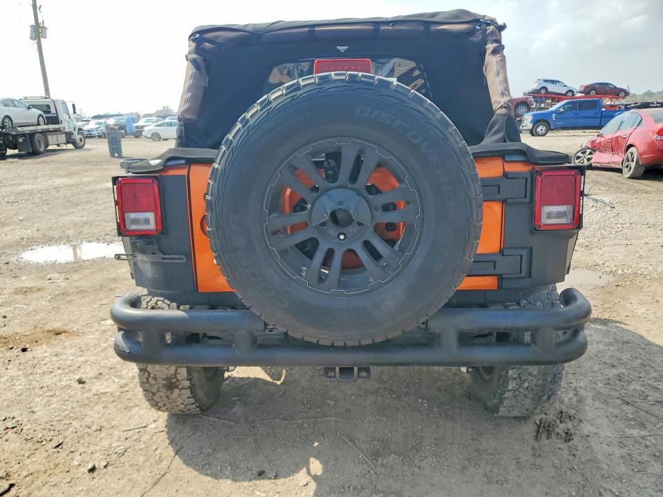 2011 Jeep Wrangler unlimited VIN 1J4BA6H18BL514339 COPART salvage auction — FRONT END, TX - SALVAGE VEHICLE TITLE, sold $2,200 on 2026-07-02 (photo 6)