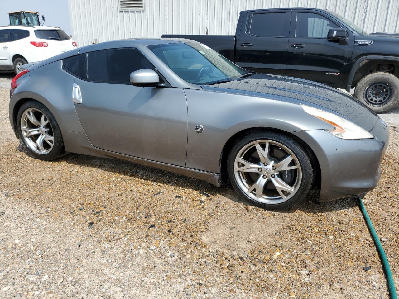 2011 NISSAN 370Z VIN JN1AZ4EH9BM551249 COPART salvage auction — REAR END, TX - CERTIFICATE OF TITLE, sold $4,050 on 2025-04-16 (photo 4)