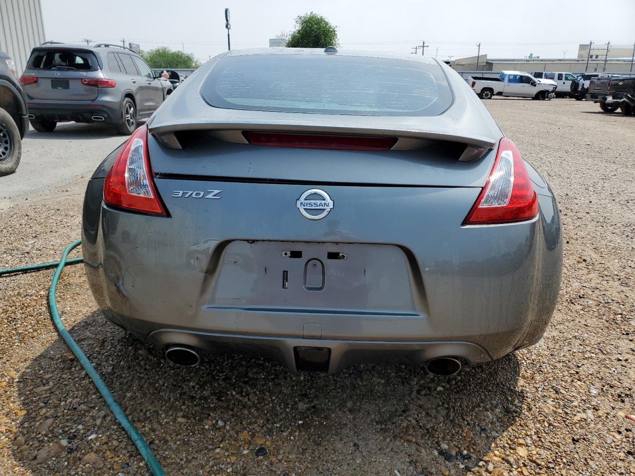 2011 NISSAN 370Z VIN JN1AZ4EH9BM551249 COPART salvage auction — REAR END, TX - CERTIFICATE OF TITLE, sold $4,050 on 2025-04-16 (photo 6)