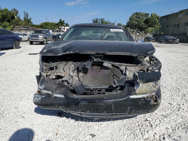 2002 Mercury Grand marquis VIN 2MEFM74W52X665758 COPART salvage auction — FRONT END, Fl - Cert Of Title Slvg Rebuildable, sold $425 on 2026-07-28 (photo 5)