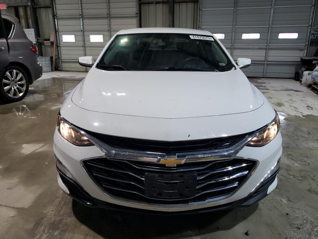 2020 Chevrolet Malibu limited VIN 1G1ZD5ST3LF098256 COPART salvage auction — Side, MO - SALVAGE CERTIFICATE OF TITLE, sold $3,200 on 2025-08-08 (photo 5)