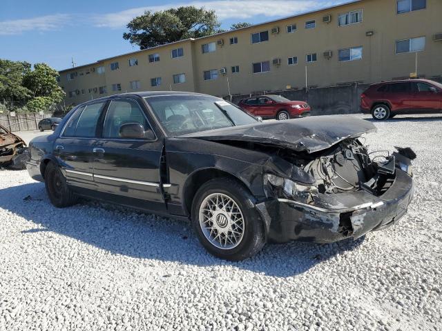 2002 Mercury Grand marquis VIN 2MEFM74W52X665758 COPART salvage auction — FRONT END, Fl - Cert Of Title Slvg Rebuildable, sold $425 on 2026-07-28 (photo 4)