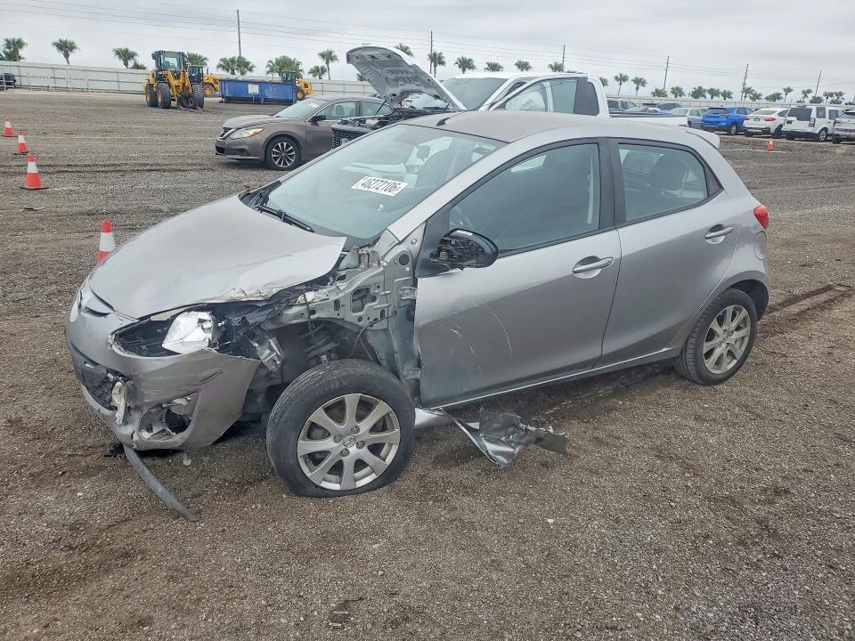 2012 Mazda 2 VIN JM1DE1LZ9C0135890 COPART salvage auction — FRONT END, Fl - Cert Of Title Slvg Rebuildable, sold $575 on 2026-07-27 (photo 1)