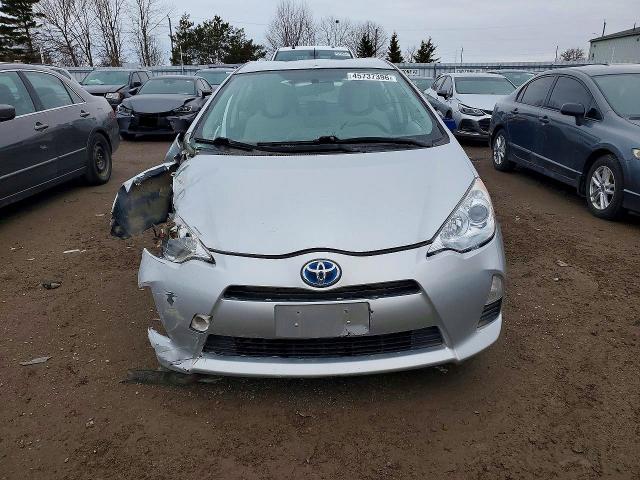 2013 Toyota Prius c VIN JTDKDTB37D1540208 COPART salvage auction — ALL OVER, On - Permit Irrepairable, sold $625 on 2026-07-07 (photo 5)
