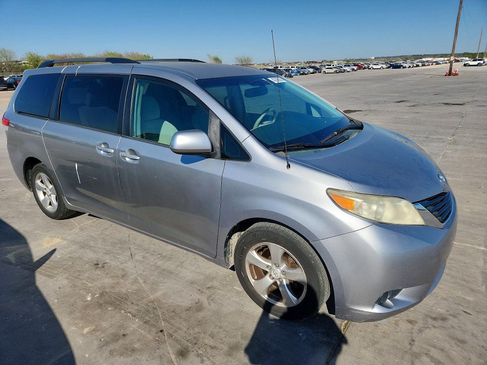 2012 Toyota Sienna VIN 5TDKK3DC8CS264254 COPART salvage auction — SIDE, Tx - Certificate Of Title, sold $1,450 on 2026-07-30 (photo 4)