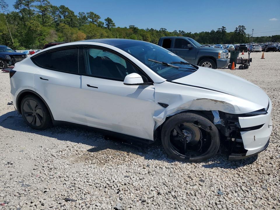 2026 Tesla Model y VIN 7SAYGDEE4TA449584 COPART salvage auction — SIDE, Tx - Certificate Of Title, sold $20,800 on 2026-09-22 (photo 4)