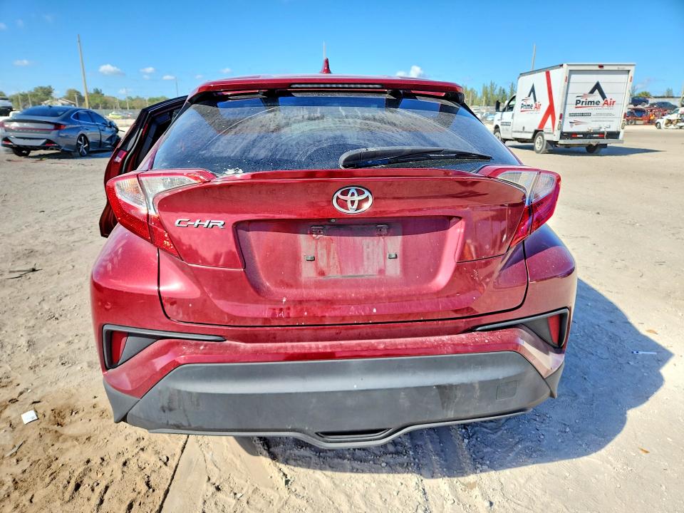 2018 Toyota C-hr VIN JTNKHMBXXJ1008164 COPART salvage auction — SIDE, Fl - Cert Of Title Slvg Rebuildable, sold $3,900 on 2026-08-01 (photo 6)