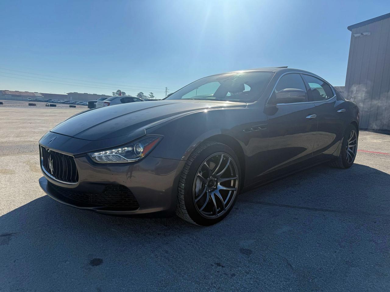 2017 Maserati Ghibli VIN ZAM57XSA9H1206127 COPART salvage auction — Damage History, Tx - Salvage Cert-Manufacturer Buyb (P), sold $25,000 on 2026-04-13 (photo 2)