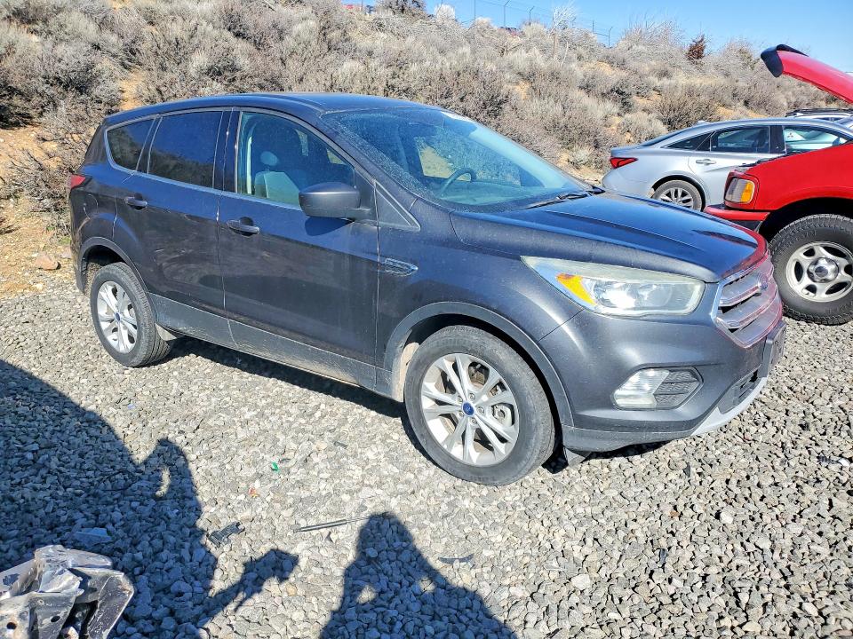 2017 Ford Escape VIN 1FMCU9G90HUD44681 COPART salvage auction — MINOR DENT/SCRATCHES, Nv - Certificate Of Title, sold $675 on 2026-09-03 (photo 4)