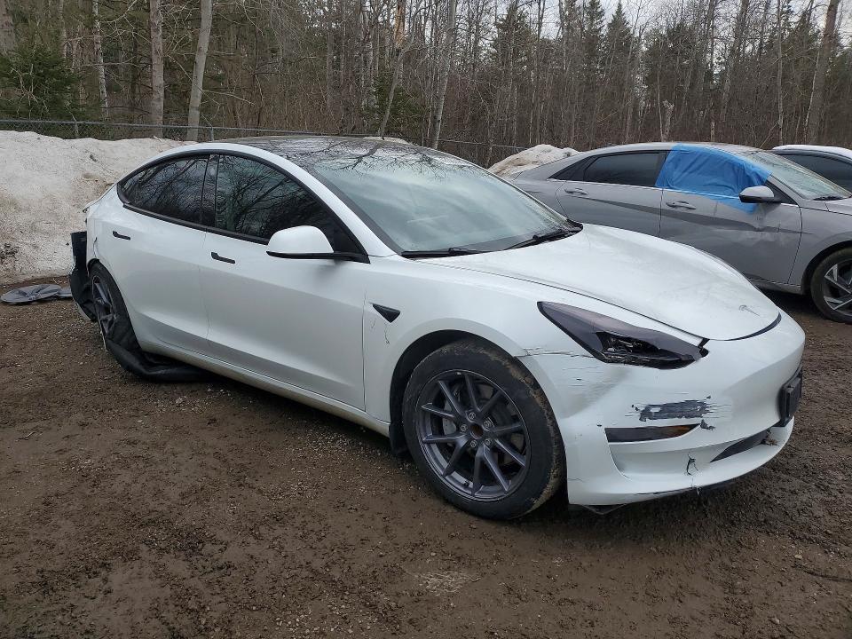 2023 Tesla Model 3 VIN LRW3E1FA0PC845232 COPART salvage auction — REAR END, Salvage Title, sold $8,300 on 2026-07-14 (photo 4)