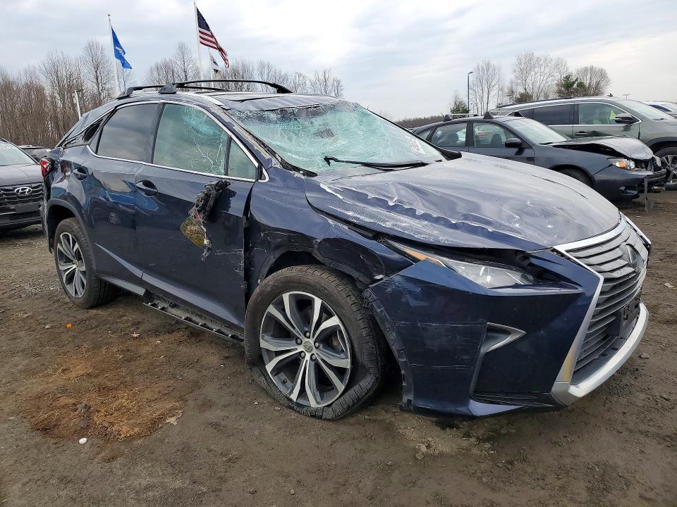 2017 Lexus Rx VIN 2T2BZMCA7HC088827 COPART salvage auction — ROLLOVER, Id - Salvage Certificate Of Title, sold $4,700 on 2026-07-02 (photo 4)