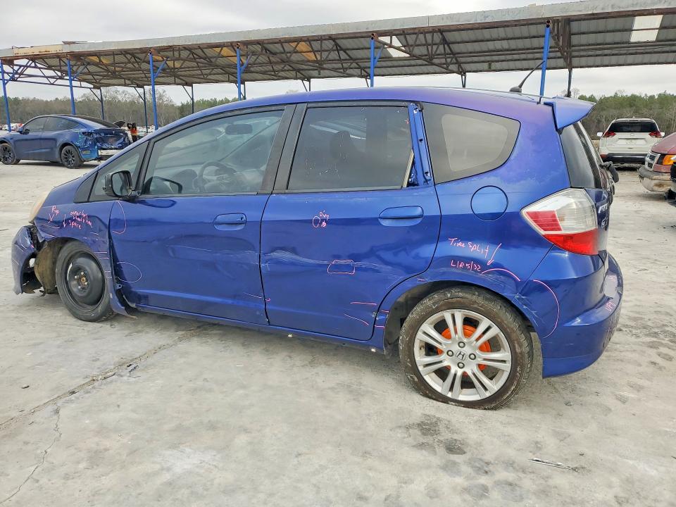 2009 Honda Fit VIN JHMGE886X9S056423 COPART salvage auction — SIDE, GA - CERT OF TITLE-SALVAGE, sold $575 on 2026-07-09 (photo 2)