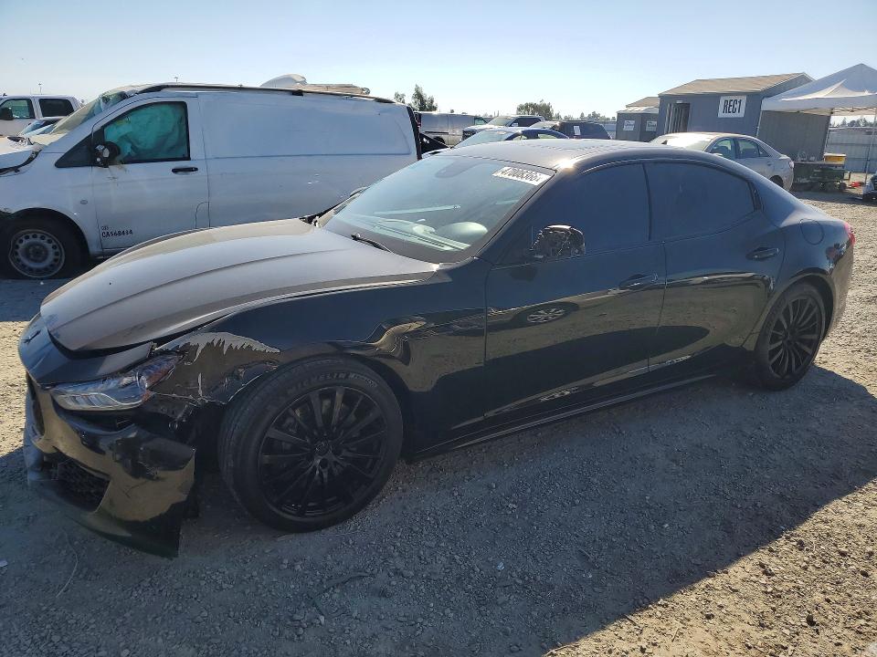 2018 Maserati Ghibli VIN ZAM57YTA4J1301673 COPART salvage auction — SIDE, Fl - Derelict Vehicle Certificate, sold $20 on 2026-07-28 (photo 1)