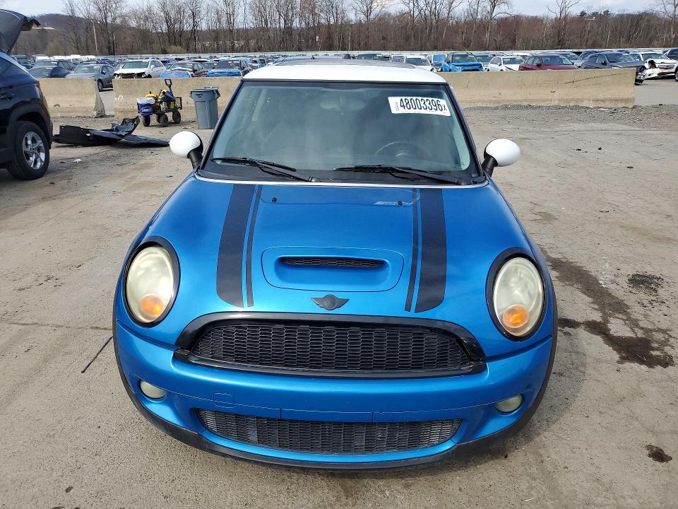2009 Mini Cooper VIN WMWMF73589TW87141 COPART salvage auction — NORMAL WEAR, Fl - Certificate Of Title (P), sold $1,550 on 2026-07-09 (photo 5)