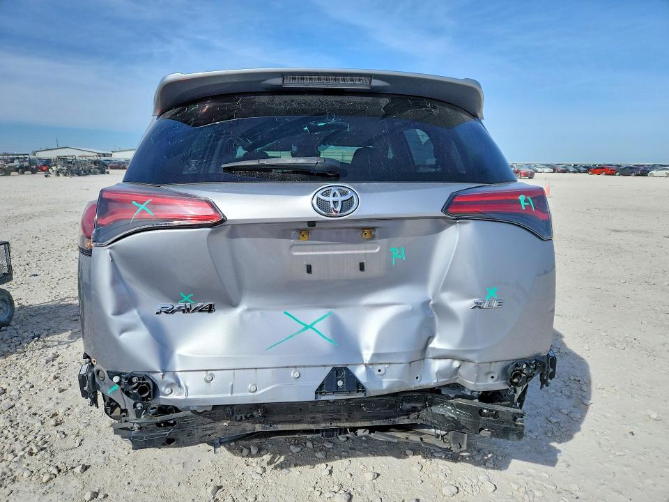 2018 Toyota VIN JTMWFREV7JD126299 COPART salvage auction — REAR END, Tx - Salvage Vehicle Title, sold $6,700 on 2026-07-02 (photo 6)