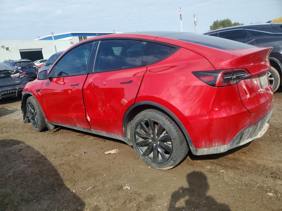 2023 Tesla Model y VIN 7SAYGDEE2PF761685 COPART salvage auction — SIDE, ON - PERMIT NO BRAND - UNFIT, sold $18,450 on 2026-07-16 (photo 2)
