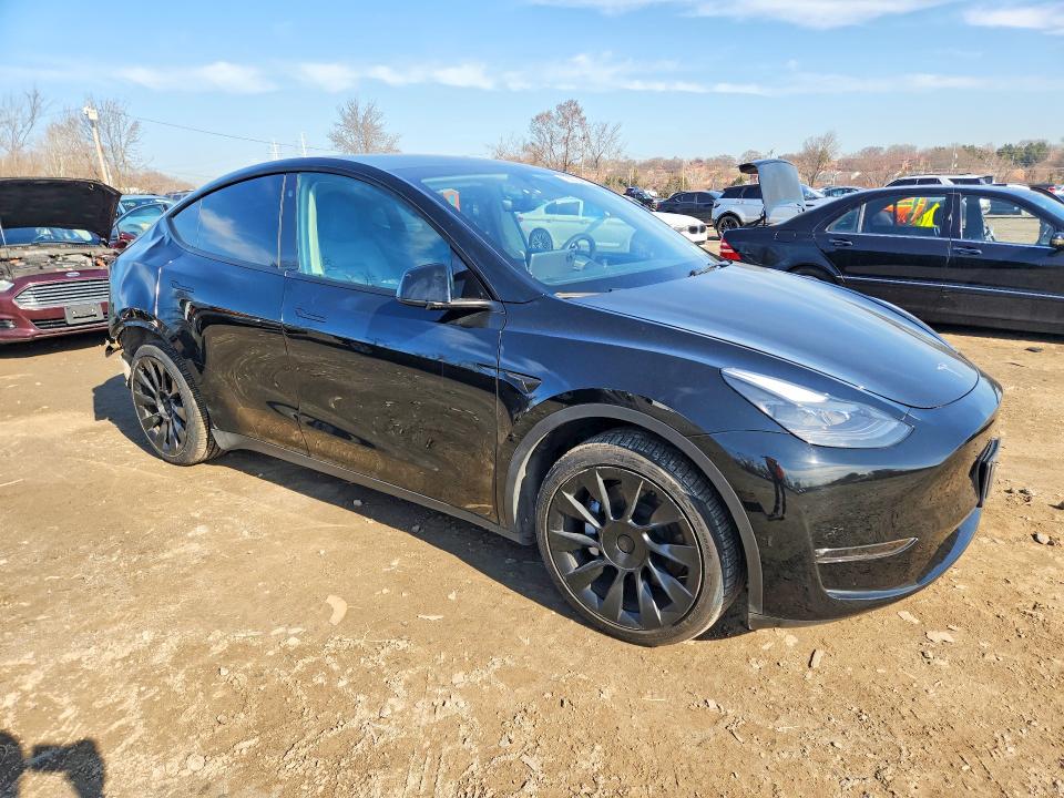 2023 Tesla Model y VIN 7SAYGDEE3PF607258 COPART salvage auction — REAR END, Id - Salvage Certificate Of Title, sold $12,600 on 2026-07-09 (photo 4)