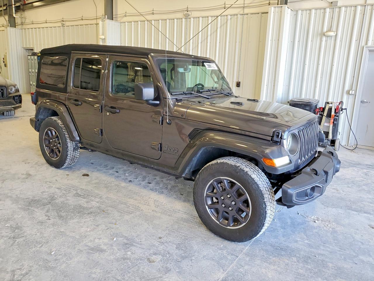 2021 Jeep Wrangler Unlimited VIN 1C4HJXDN3MW712097 COPART salvage auction — Minor Dent/Scratches, MO - CERTIFICATE OF TITLE, sold $18,400 on 2026-07-09 (photo 4)