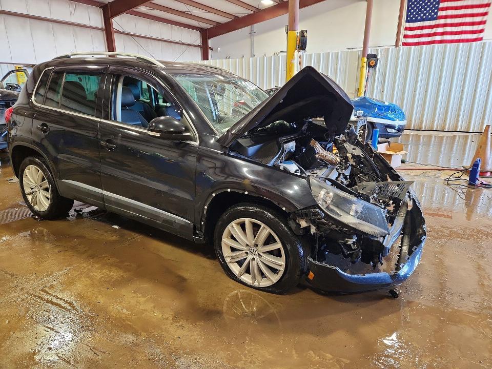 2014 Volkswagen Tiguan VIN WVGAV3AX2EW597977 COPART salvage auction — FRONT END, Salvage Title, sold $400 on 2026-07-17 (photo 4)